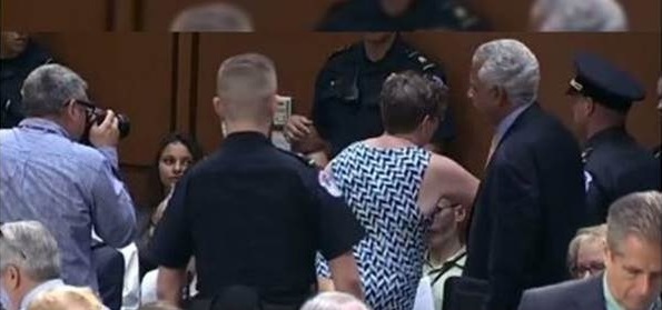 Woman "protestor" disrupting Kavanaugh hearing before being ejected.